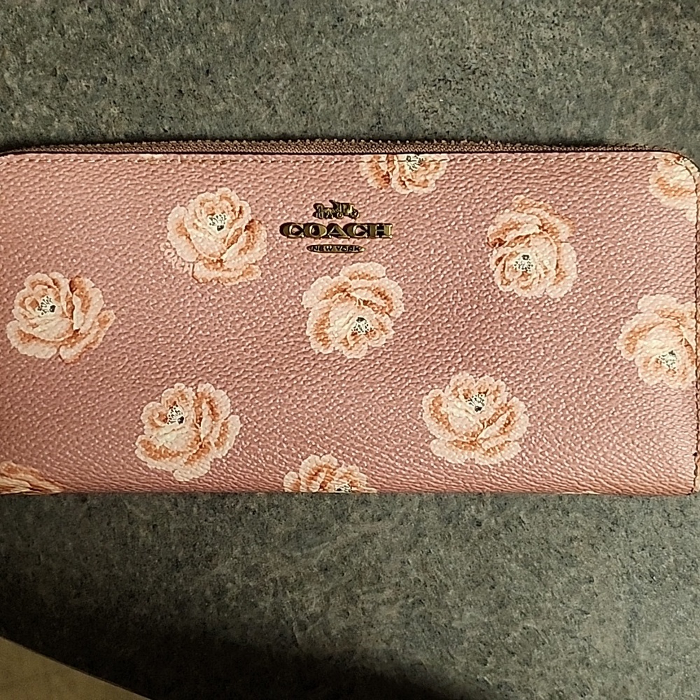 Pink Coach wallet.